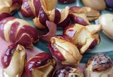 Popped  Nu&ntilde;as don't expand as much as popcorn.